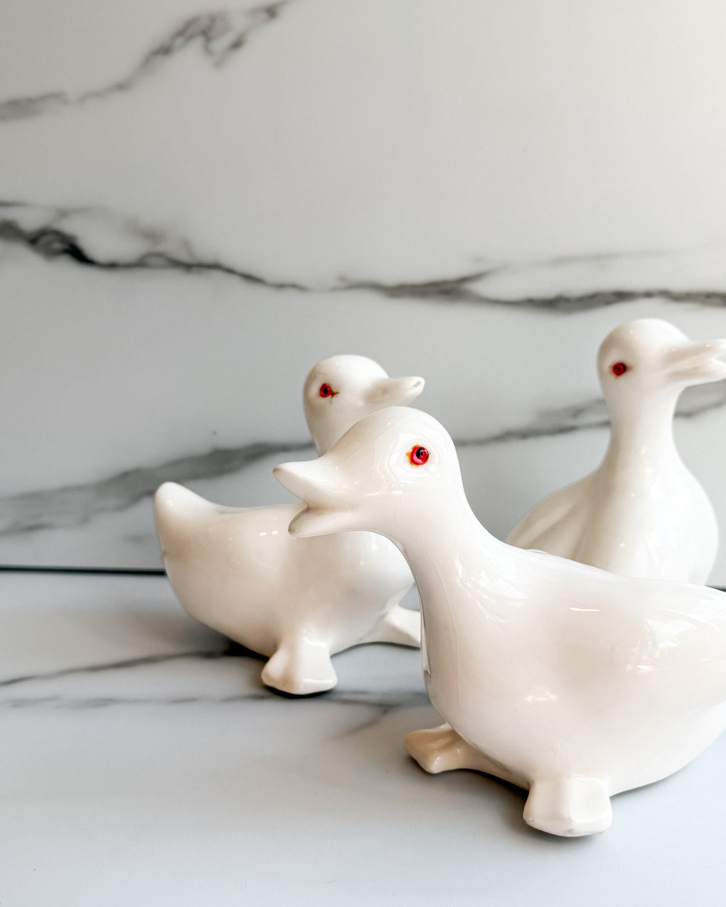 Vintage White Ceramic Duck Figurines with Red Eyes Set of 3