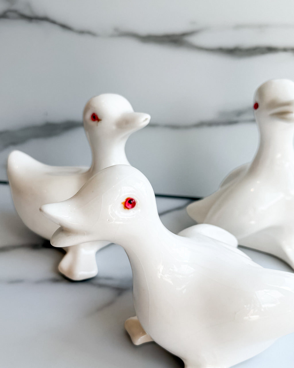 Vintage White Ceramic Duck Figurines with Red Eyes Set of 3