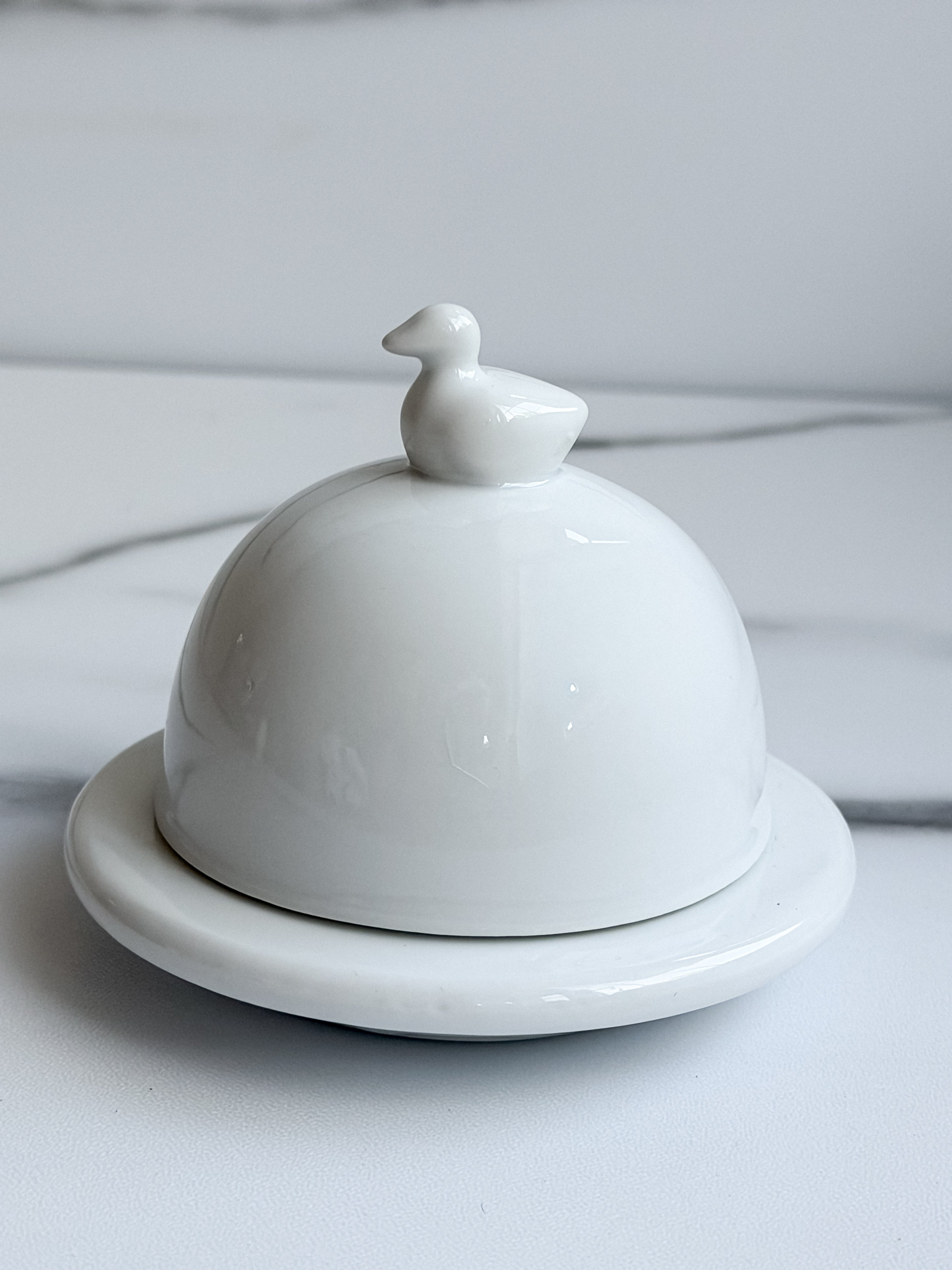 White Ceramic Butter Dish with Duck Handle Lid