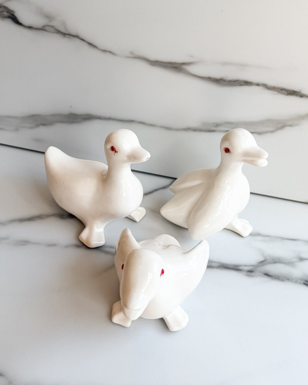 Vintage White Ceramic Duck Figurines with Red Eyes Set of 3