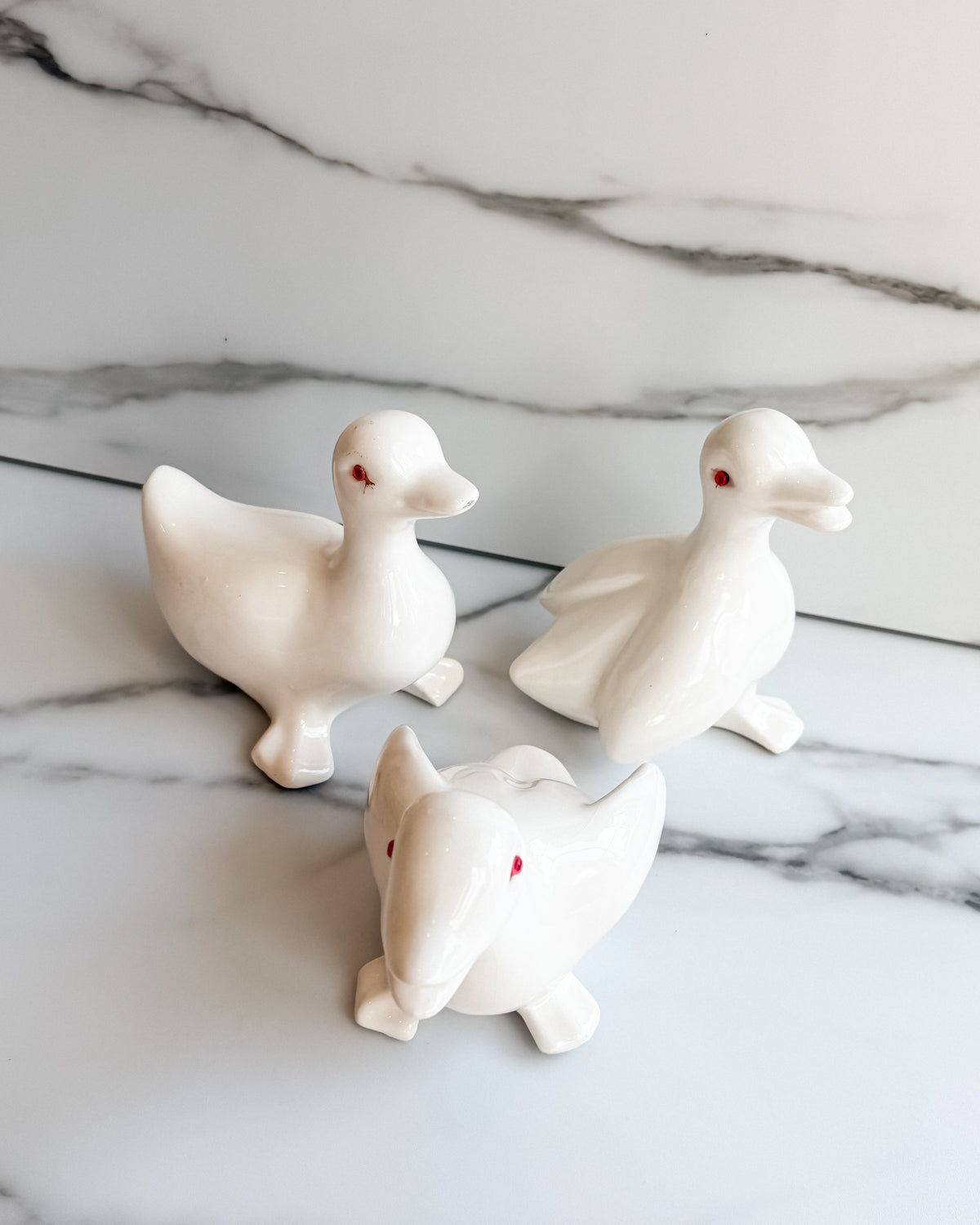 Vintage White Ceramic Duck Figurines with Red Eyes Set of 3