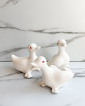 Vintage White Ceramic Duck Figurines with Red Eyes Set of 3