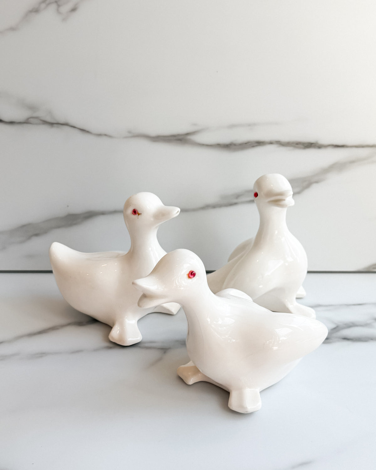 Vintage White Ceramic Duck Figurines with Red Eyes Set of 3