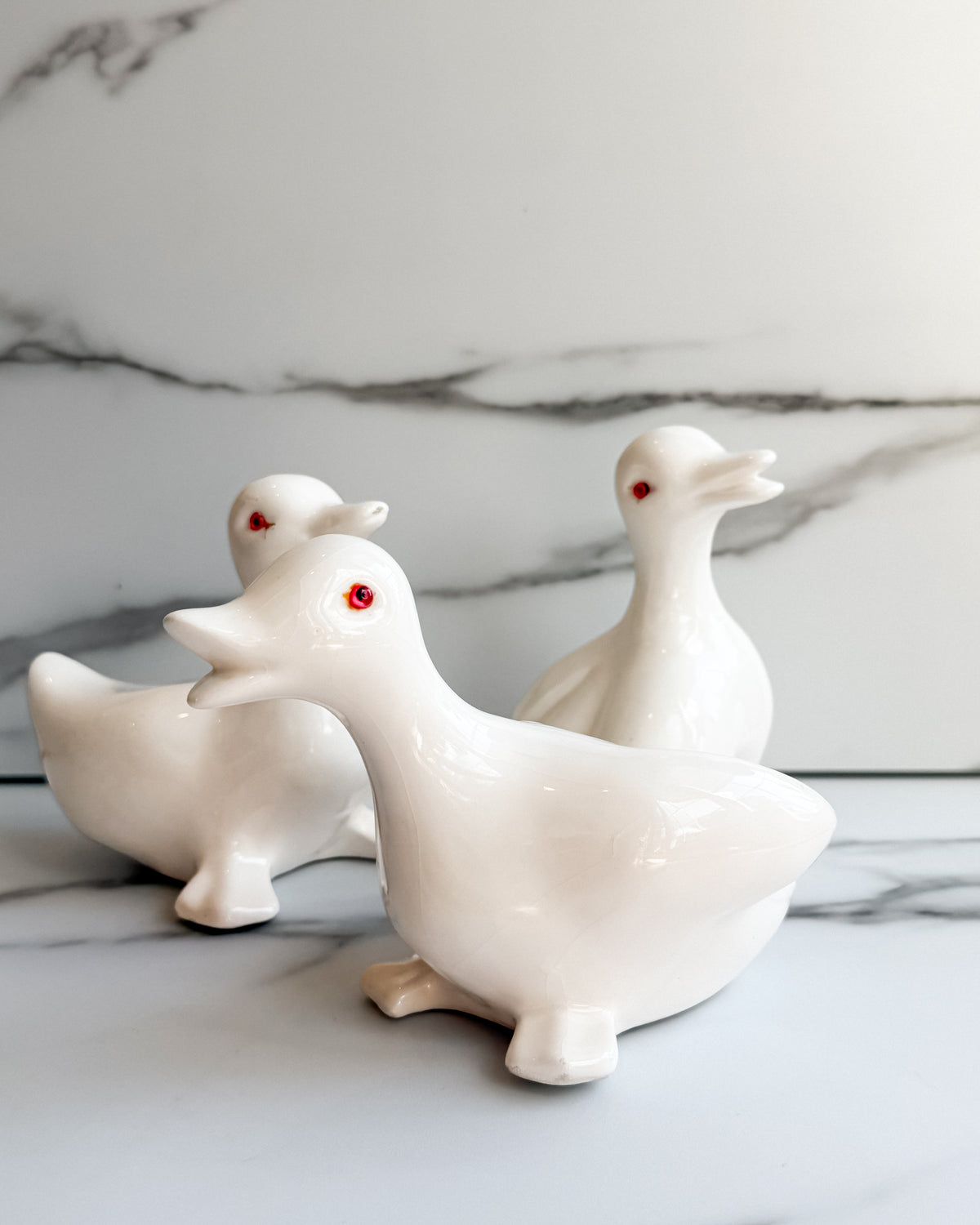 Vintage White Ceramic Duck Figurines with Red Eyes Set of 3